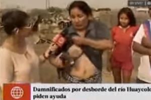 (VIDEO) MADRE DE DIOS! Usred reportaže o poplavama izvadila prase i počela da ga doji!